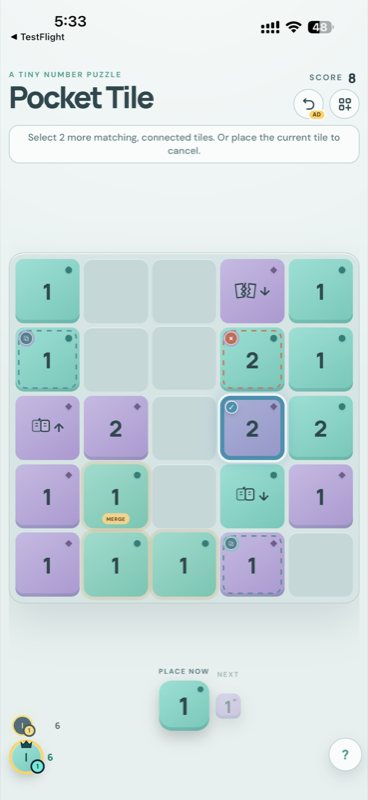 Pocket Tile active gameplay with merge-ready tiles highlighted